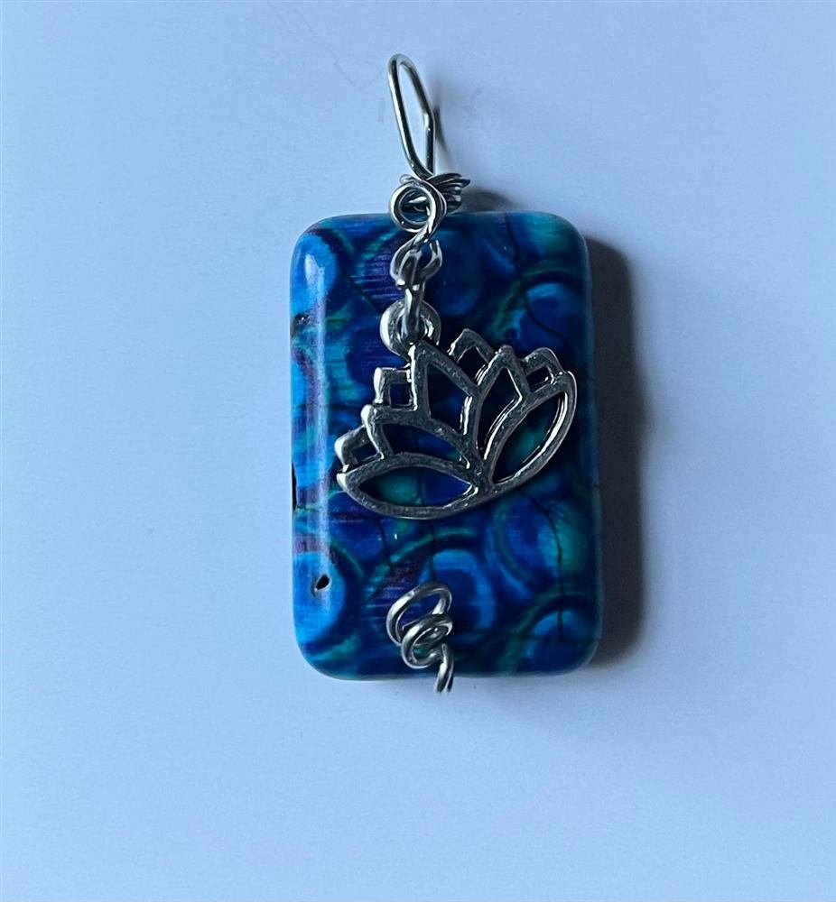 Blue Peacock Bead Pendant with lotus, handmade by Wilhelmina St&ouml;cker
